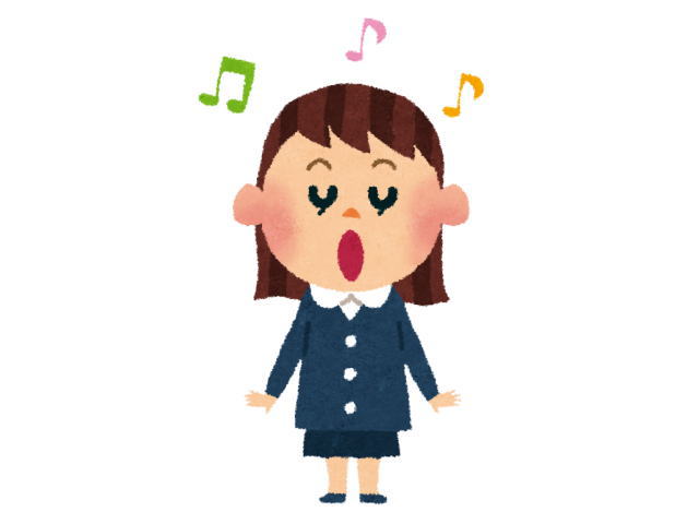 子供が幼稚園で大きな声で歌を歌っている様子